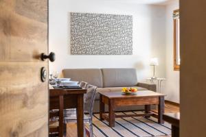 Et opholdsområde på Hostdomus - La Garnotte Suites