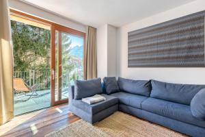 Et opholdsområde på Hostdomus - La Garnotte Suites