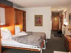 a bedroom with a bed in a room at Apartment Aragon M86 by Interhome in Fiesch +68 photos