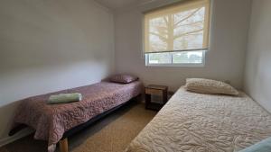 En eller flere senge i et værelse på Oceana Suites El Tabo + 9 billeder