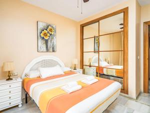 En eller flere senge i et værelse på Apartment Erisa II by Interhome