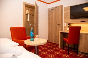 Et tv og/eller underholdning på Hotel Hößl - Wirtshaus zum Stichn