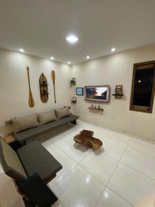 TV a/nebo společenská místnost v ubytování Recanto do Ofurô