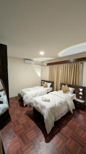 Ένα ή περισσότερα κρεβάτια σε δωμάτιο στο TUYU Chhye