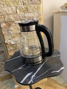 Příslušenství pro přípravu čaje a kávy v ubytování Pyramids essence view