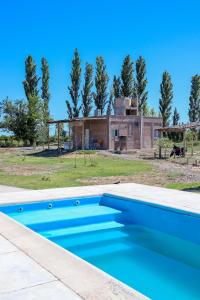 Swimmingpoolen hos eller tæt på Cabañas de la bodega Romano-Pin
