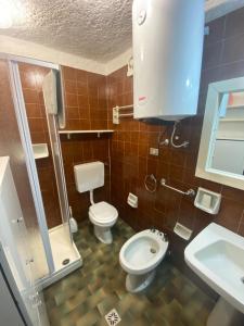 Koupelna v ubytování Brenta apartment + 20 fotografií