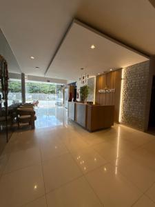 a lobby of a hotel with a reception desk at Hotel Norte in Macapá