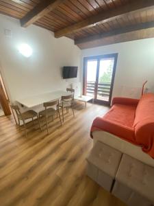 TV a/nebo společenská místnost v ubytování Brenta apartment