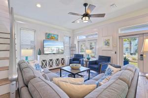 a living room with a couch and chairs and a tv at Arrabella - Gulf Views with Deck & Community Pool in Santa Rosa Beach