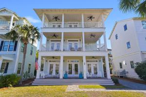 a large white house with a porch and a balcony at Arrabella - Gulf Views with Deck & Community Pool in Santa Rosa Beach