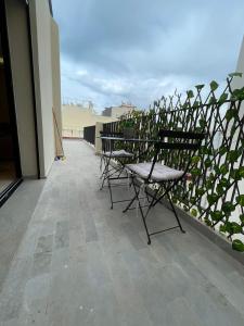 En balkon eller terrasse på Studio moderne avec parking ascenseur -Maarif Centre