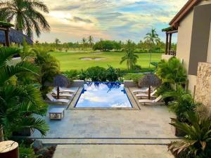 a view of a golf course from a villa at Lagos Del Mar - Casa Dos Vistas in Punta Mita