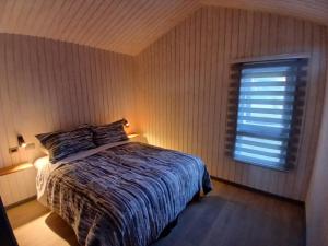 Ένα ή περισσότερα κρεβάτια σε δωμάτιο στο Cabañas Cucao