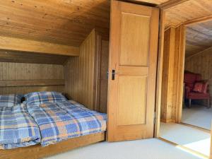 Ένα ή περισσότερα κρεβάτια σε δωμάτιο στο Revier am Waldrand