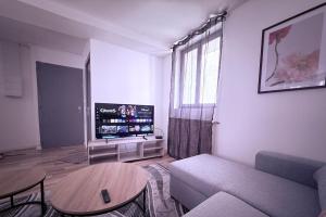 Et tv og/eller underholdning på Appartement centre historique Auxerre Arrivée autonome