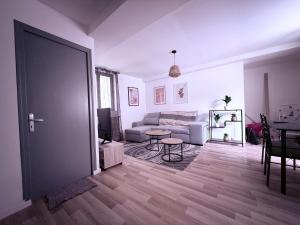 En eller flere senge i et værelse på Appartement centre historique Auxerre Arrivée autonome