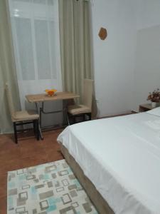 En eller flere senge i et værelse på Tonia&Sion