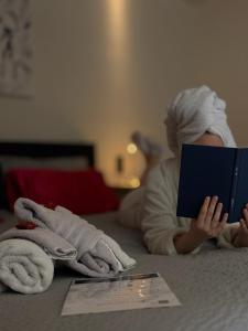 En eller flere senge i et værelse på Luxe Suite Brugge Centrum met Parking en Zen Terras