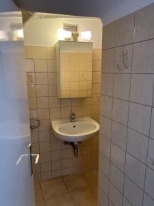 Koupelna v ubytování Yellow House Apartments - Top 5