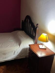 En eller flere senge i et værelse på Departamento Aagaard Brandt