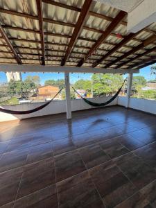 En balkon eller terrasse på Quarto casal Com mais 1 cama solteiro 2 andar FT