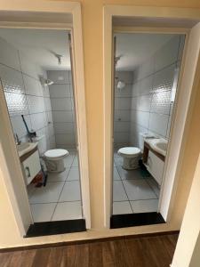 Et badeværelse på Quarto casal Com mais 1 cama solteiro 2 andar FT + 7 billeder