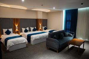 Ένα ή περισσότερα κρεβάτια σε δωμάτιο στο Wlat Hotel +31 φωτογραφίες