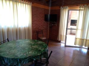 TV a/nebo společenská místnost v ubytování Complejo cabañas Victor II