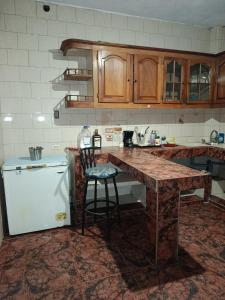 Kuchyň nebo kuchyňský kout v ubytování Casa cerca a la playa y al aeropuerto