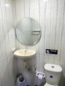 Et badeværelse på Hospedaje GRAND H Rodadero & Suite + 12 billeder