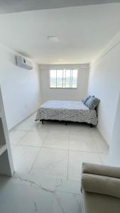 En eller flere senge i et værelse på Casa 2 quartos Mirante Piratininga