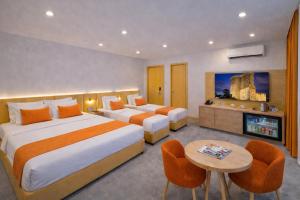 Postel nebo postele na pokoji v ubytování Khatai Deluxe Hotel + 97 fotografií