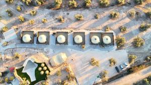 an overhead view of a group of silos at Glamping El Refugio in Archidona +82 photos