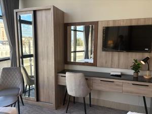 Et tv og/eller underholdning på غرف بالقرب من الحرمHotel Near Masjid nabawi