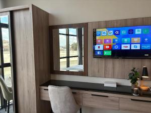 Et tv og/eller underholdning på غرف بالقرب من الحرمHotel Near Masjid nabawi + 25 billeder