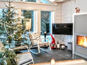 Et opholdsområde på Holiday Home Villa paasirinne a + 25 billeder