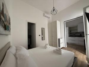 Postel nebo postele na pokoji v ubytování Amarvi'