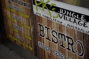 a sign that is on the side of a building at PK's Jungle Village in Cape Tribulation
