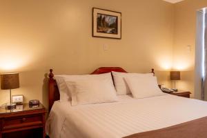 En eller flere senge i et værelse på El Marquez Huancayo