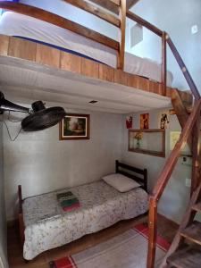 En eller flere senge i et værelse på Hostel Sossego do Garças