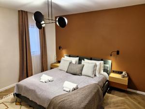 En eller flere senge i et værelse på Hévíz Luxury by STN