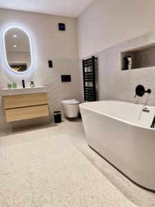 Et badeværelse på Hévíz Luxury by STN