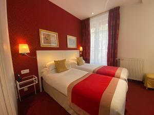 Llit o llits en una habitació de Austin's Saint Lazare Hotel 82 fotos més