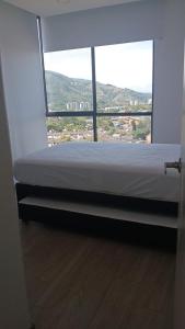 En eller flere senge i et værelse på Torres de barlovento luxury + 17 billeder