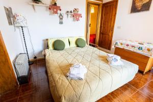 Giường trong phòng chung tại Il Rifugino