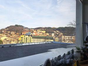 a view of a city from a window at Balkan Tower Elegance by K in Gabrovo