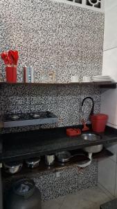 Køkken eller tekøkken på Kitnets do Jota