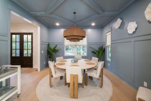 a dining room with a table and chairs at 3151 Baywood Drive in Seabrook Island