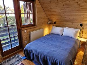 Postel nebo postele na pokoji v ubytování Colorful Life by STN